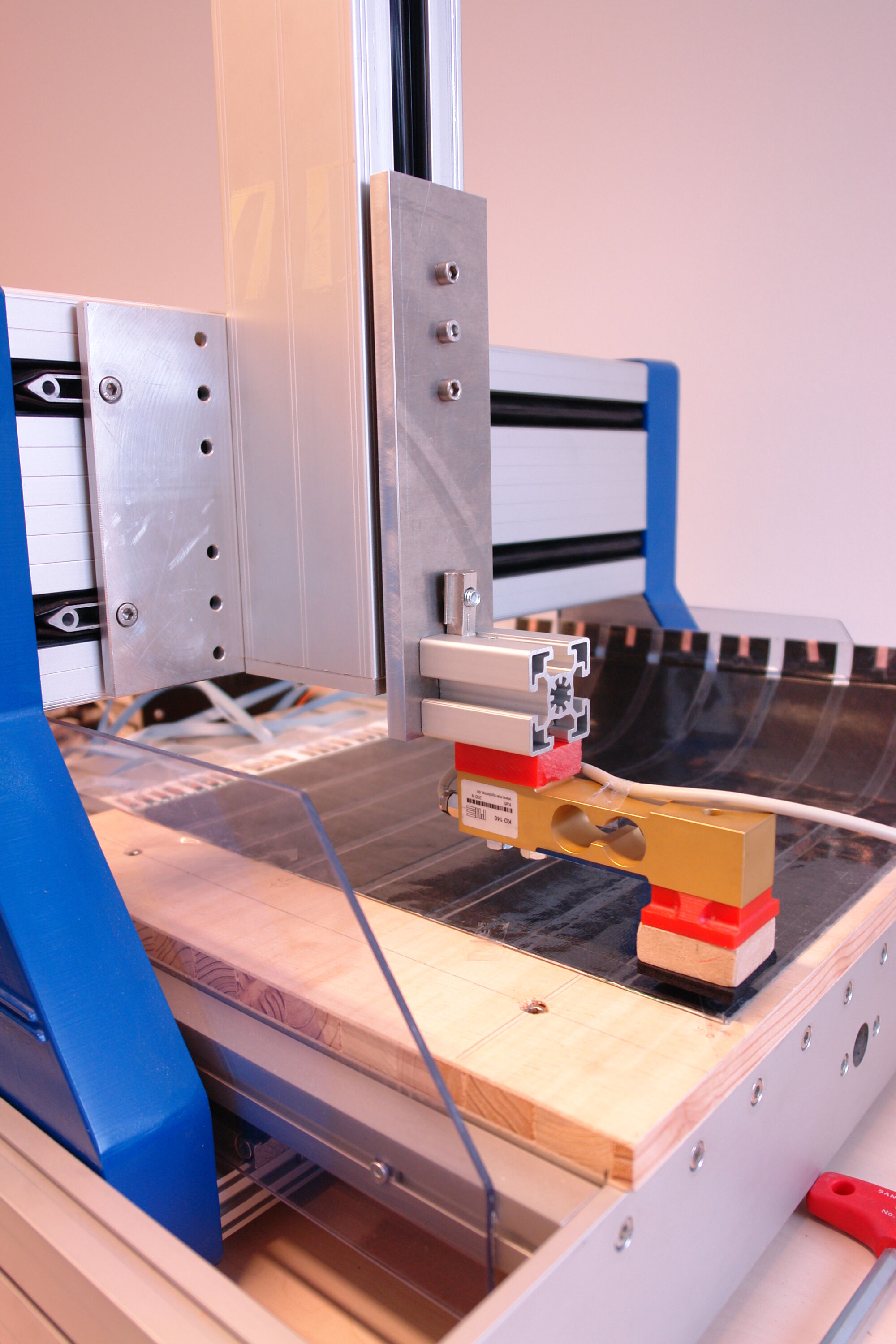 Evaluation force response and durability with linear table and strain gauge.